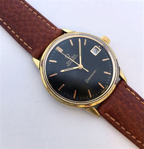 omega seamaster gold black dial 1960|black omega seamaster automatic vintage.